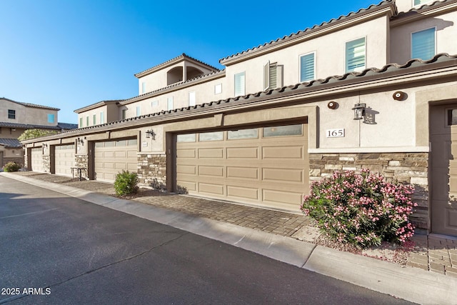 view of front of property with a garage