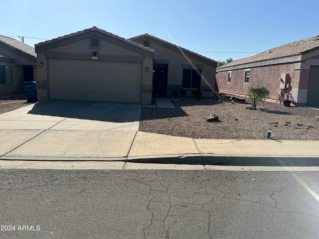 view of front of home with a garage