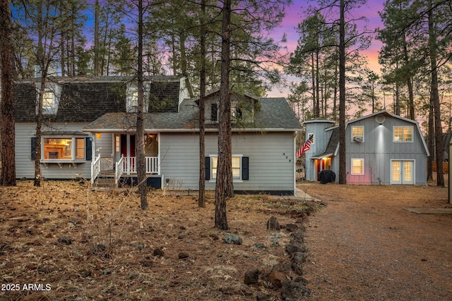 dutch colonial with roof with shingles