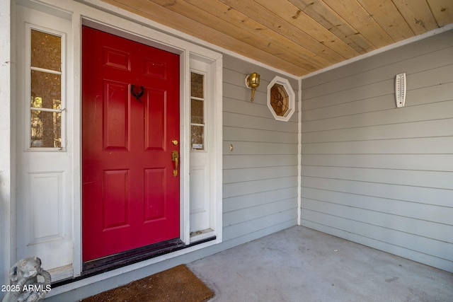 doorway to property featuring covered porch