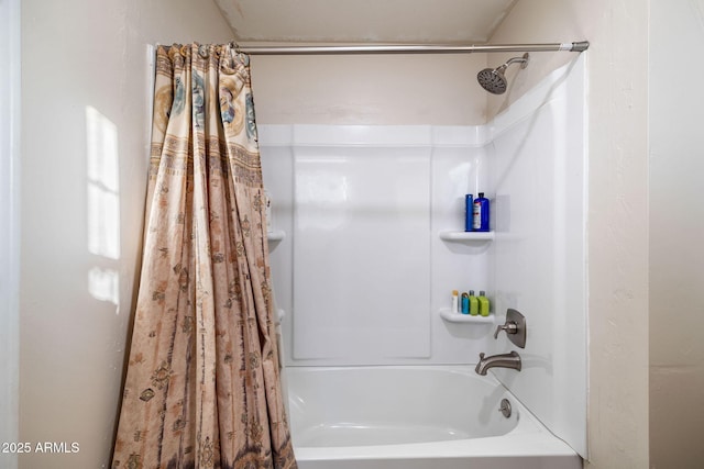 bathroom with shower / bathtub combination with curtain