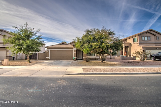 view of front of home with a garage