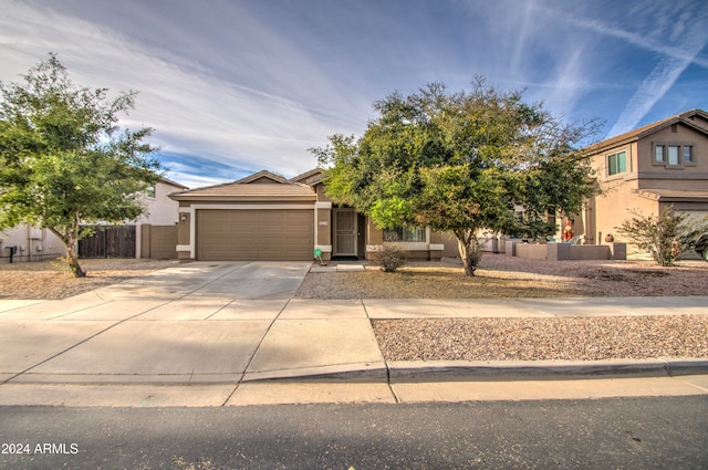 view of front of property featuring a garage