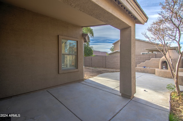 view of patio / terrace featuring a fireplace