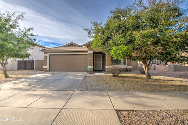 view of front of property featuring a garage