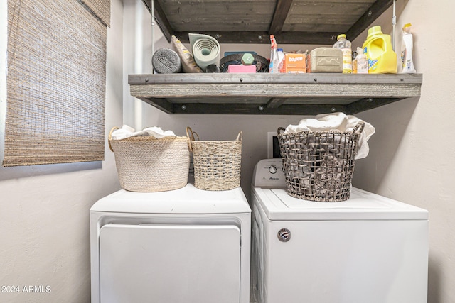 laundry room with independent washer and dryer