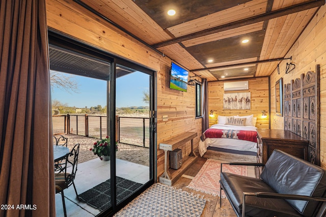 bedroom featuring a wall mounted AC, wood walls, access to exterior, and wooden ceiling