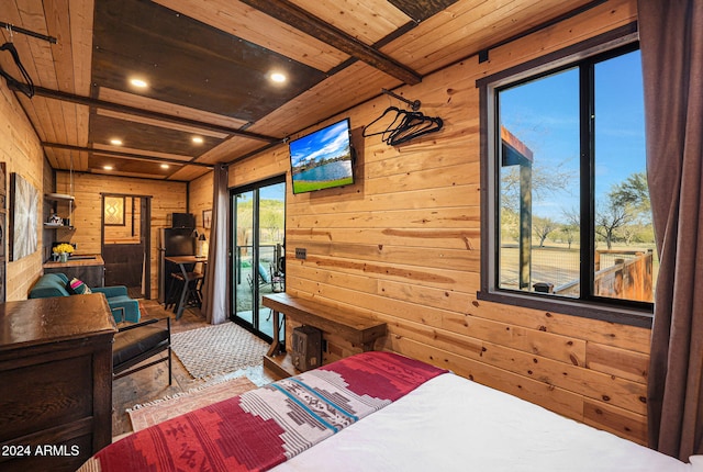 bedroom featuring beam ceiling, hardwood / wood-style flooring, wood ceiling, and wooden walls