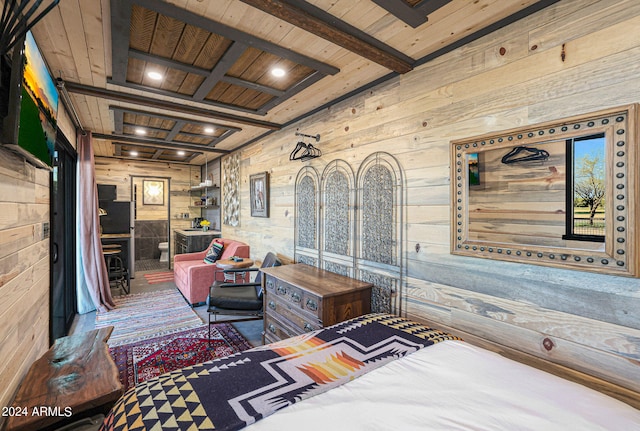 interior space with wooden walls, beamed ceiling, and wood ceiling