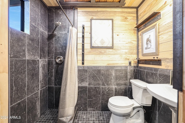 bathroom with tile patterned floors, a shower with curtain, and toilet