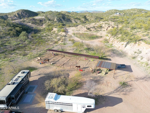 drone / aerial view featuring a mountain view