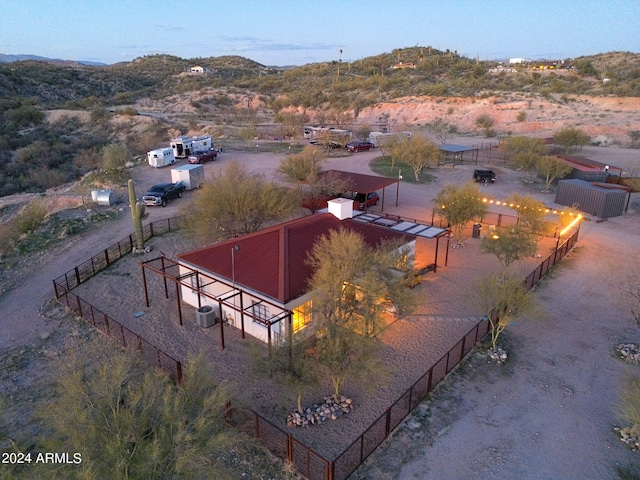 drone / aerial view featuring a mountain view