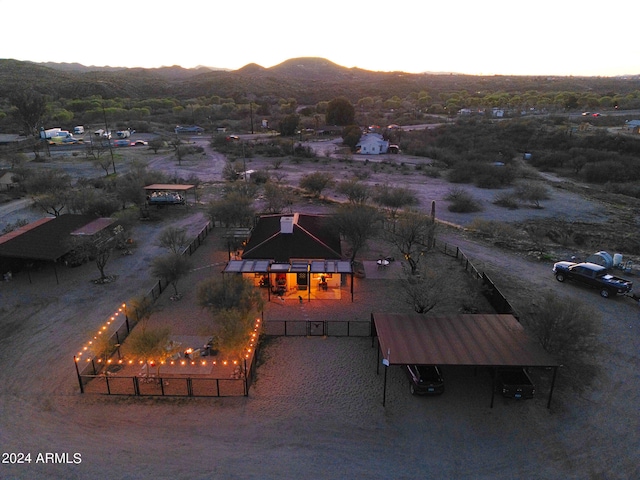 aerial view at dusk with a mountain view