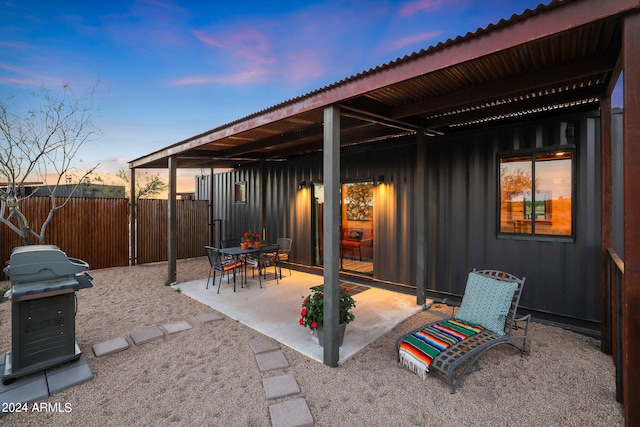 patio terrace at dusk with grilling area