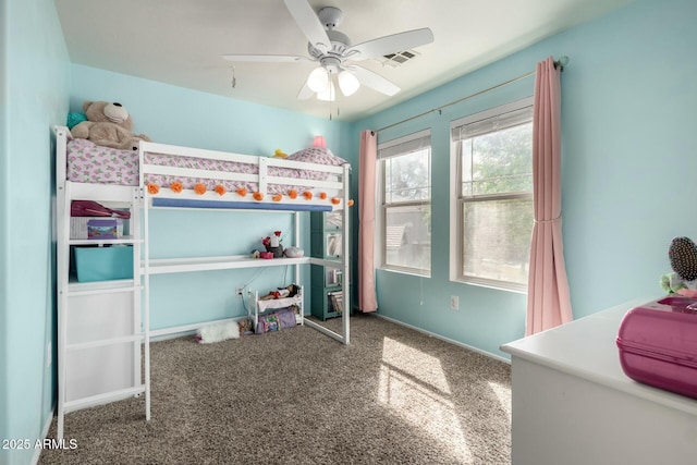 bedroom featuring carpet flooring, visible vents, and a ceiling fan