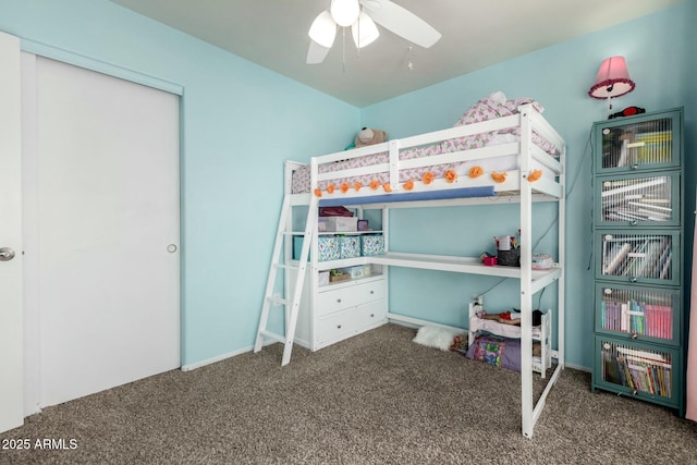 unfurnished bedroom featuring carpet floors and a ceiling fan