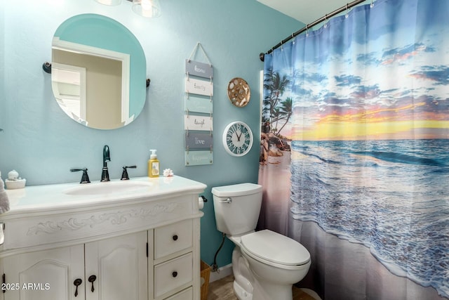 full bath with vanity and toilet