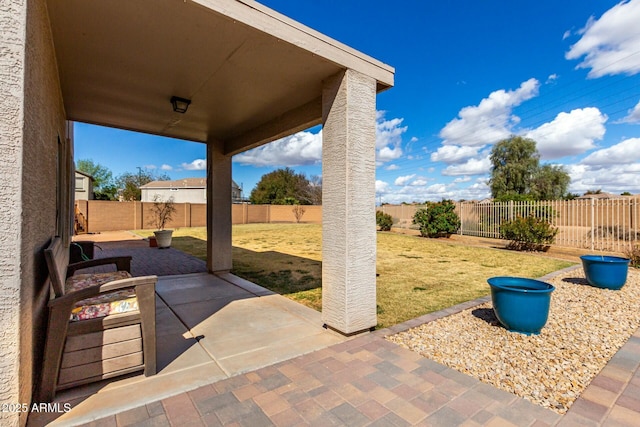 view of patio with a fenced backyard