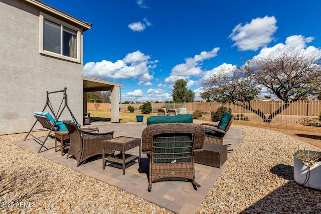 view of patio with a fenced backyard and an outdoor hangout area