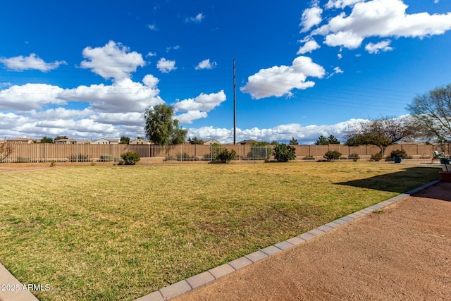 view of yard featuring a fenced backyard