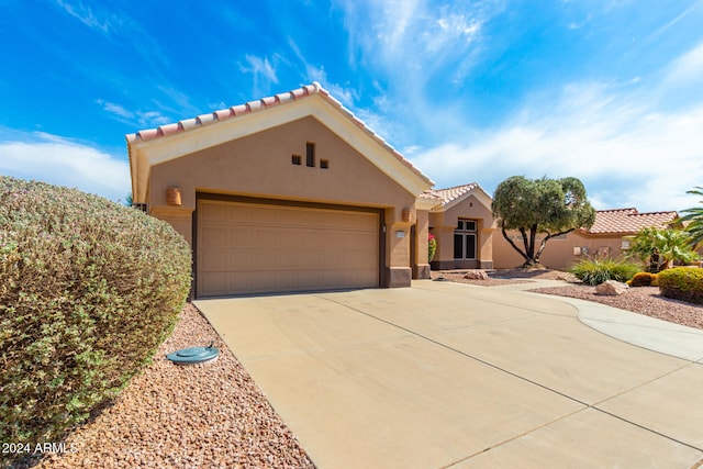 view of front of home featuring a garage