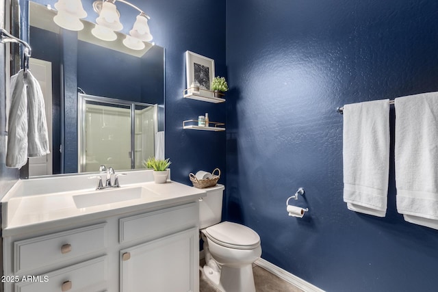 full bathroom featuring vanity, baseboards, toilet, a shower stall, and a notable chandelier