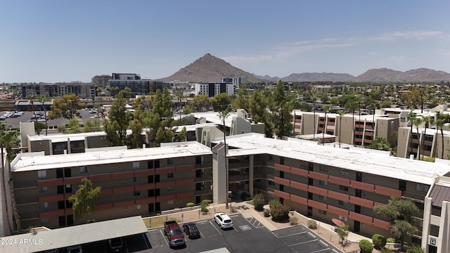 property's view of city with a mountain view