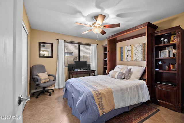 20657 N 56th Ave, Glendale, AZ 85308 - bedroom with an office area, a ceiling fan, and light tile patterned flooring