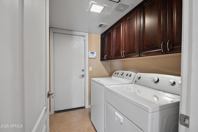 20657 N 56th Ave, Glendale, AZ 85308 - laundry room featuring cabinet space, independent washer and dryer, and light tile patterned flooring