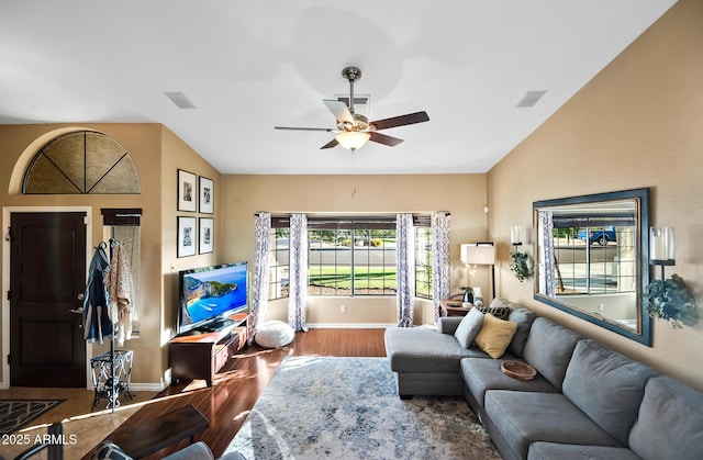 20657 N 56th Ave, Glendale, AZ 85308 - living area featuring lofted ceiling, ceiling fan, and wood finished floors