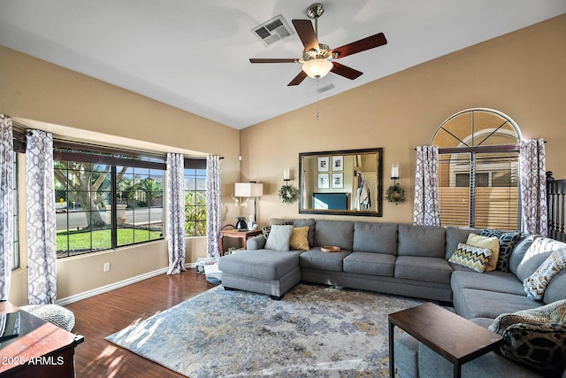 20657 N 56th Ave, Glendale, AZ 85308 - living room featuring lofted ceiling, ceiling fan, and wood finished floors