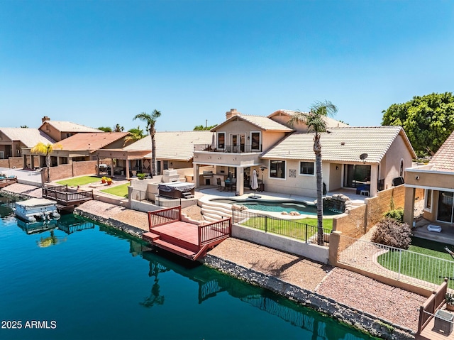 20657 N 56th Ave, Glendale, AZ 85308 - view of pool with a patio area, a fenced backyard, a dock, and a water view