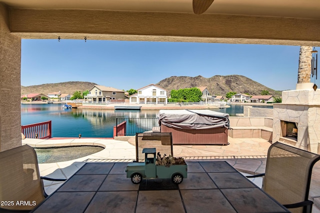 20657 N 56th Ave, Glendale, AZ 85308 - view of patio with a hot tub, a water and mountain view, grilling area, and a residential view