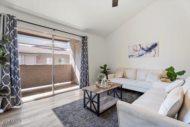 623 W Guadalupe Rd Unit 288, Mesa, AZ 85210 - living room with wood finished floors, lofted ceiling, and a ceiling fan