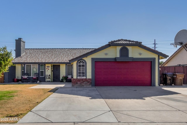 view of front of property with a garage