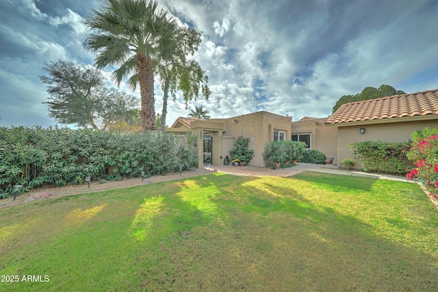 exterior space featuring a lawn