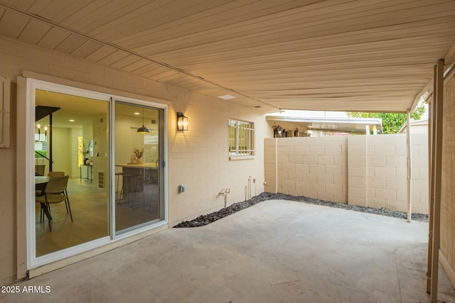 view of patio / terrace featuring fence and visible vents