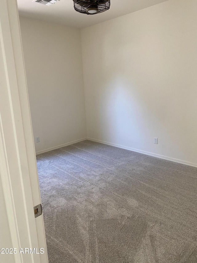 2181 N 211th Dr, Buckeye, AZ 85396 - carpeted empty room with baseboards