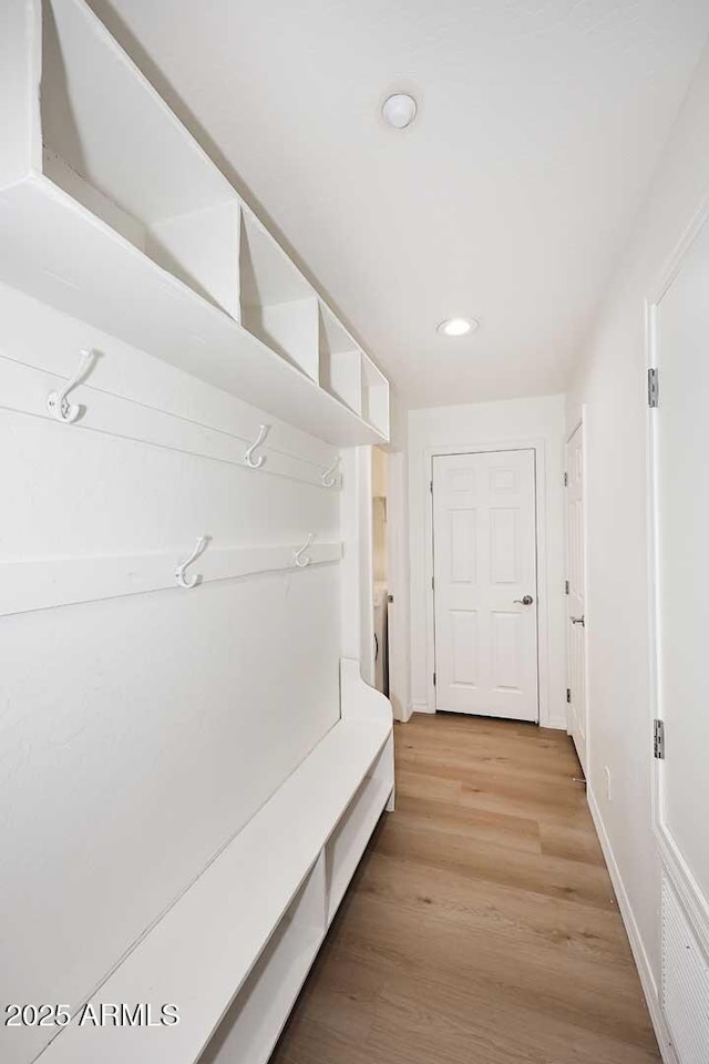 3931 E Crest Ln, Phoenix, AZ 85050 - mudroom featuring light wood-style flooring, recessed lighting, and baseboards