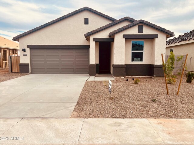 11943 E Aster Ln, Florence, AZ 85132 - ranch-style house with concrete driveway, stucco siding, fence, and an attached garage