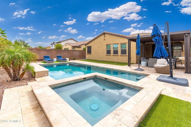 view of pool with a fenced in pool, outdoor lounge area, an in ground hot tub, a patio area, and a fenced backyard
