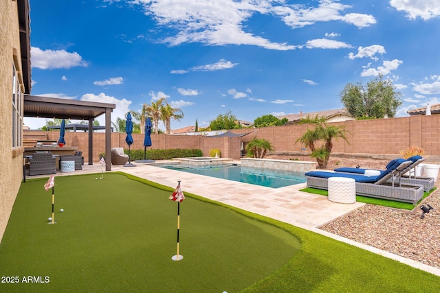 view of swimming pool with a fenced in pool, a patio area, a fenced backyard, and an in ground hot tub