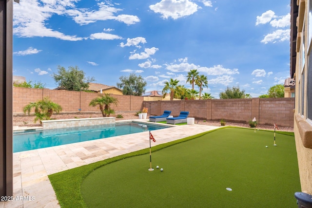 view of swimming pool with a fenced in pool, a patio area, and a fenced backyard