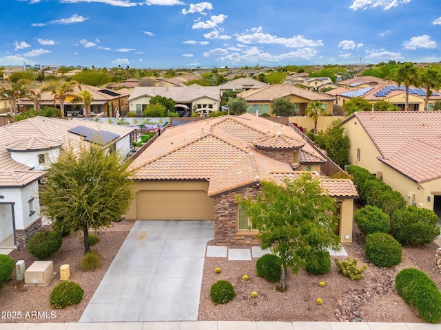 birds eye view of property with a residential view