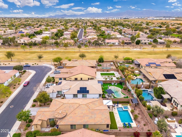 birds eye view of property featuring a residential view and a mountain view