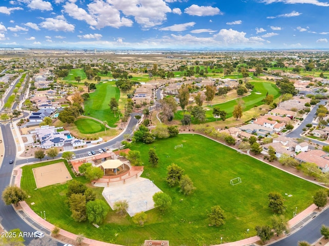 bird's eye view featuring view of golf course and a residential view