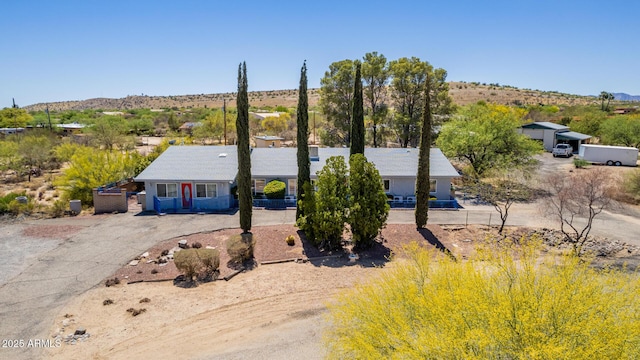 view of front of property with a mountain view