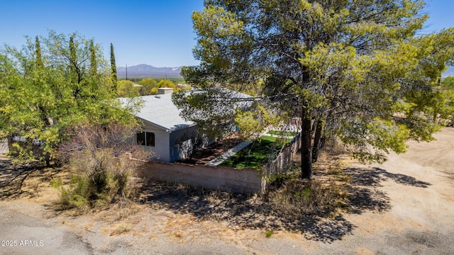 view of home's exterior featuring a mountain view
