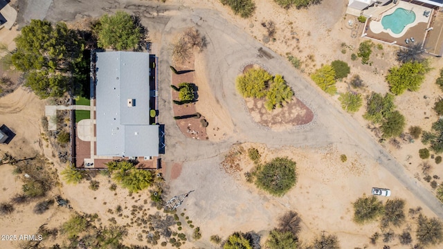 bird's eye view with a desert view