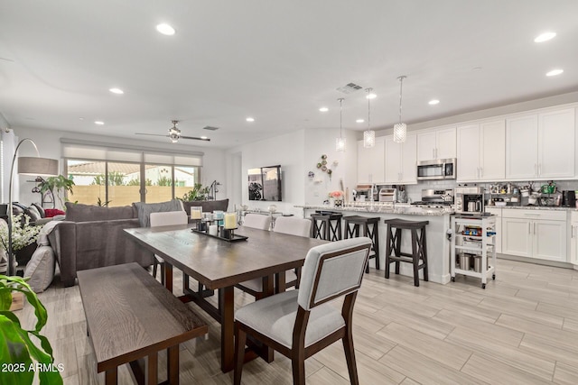 dining area featuring ceiling fan